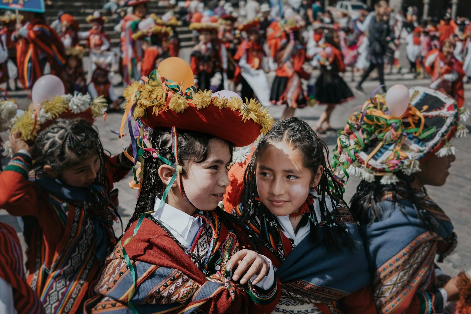 Children in traditional Cusco clothing during a local festival (cusco with kids) | Cusco Tours